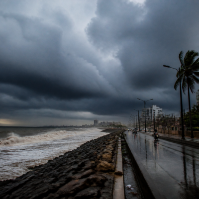 Arabian Sea cyclone clouds over Maharashtra's coastal landscape