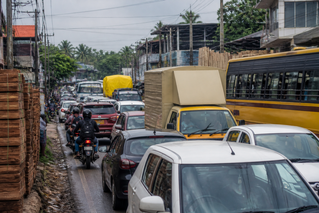 Perumbavoor traffic congestion on Kerala’s Main Central Road with buses, cars and industrial vehicles