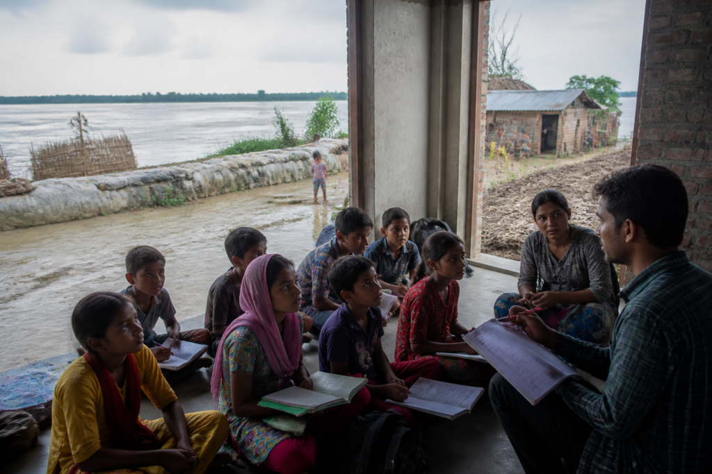 Bhutni school children attending a coaching centre after Ganga erosion and flooding in Malda