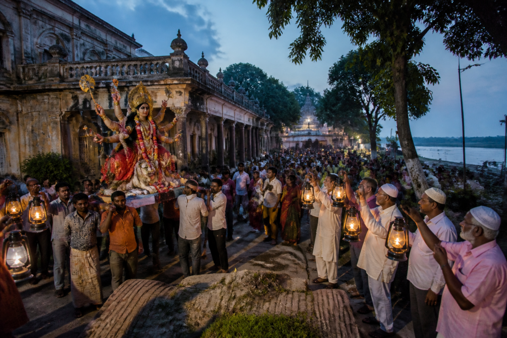 Chanchal Rajbari Durga Puja procession near the historic Chandi Mandap in Malda