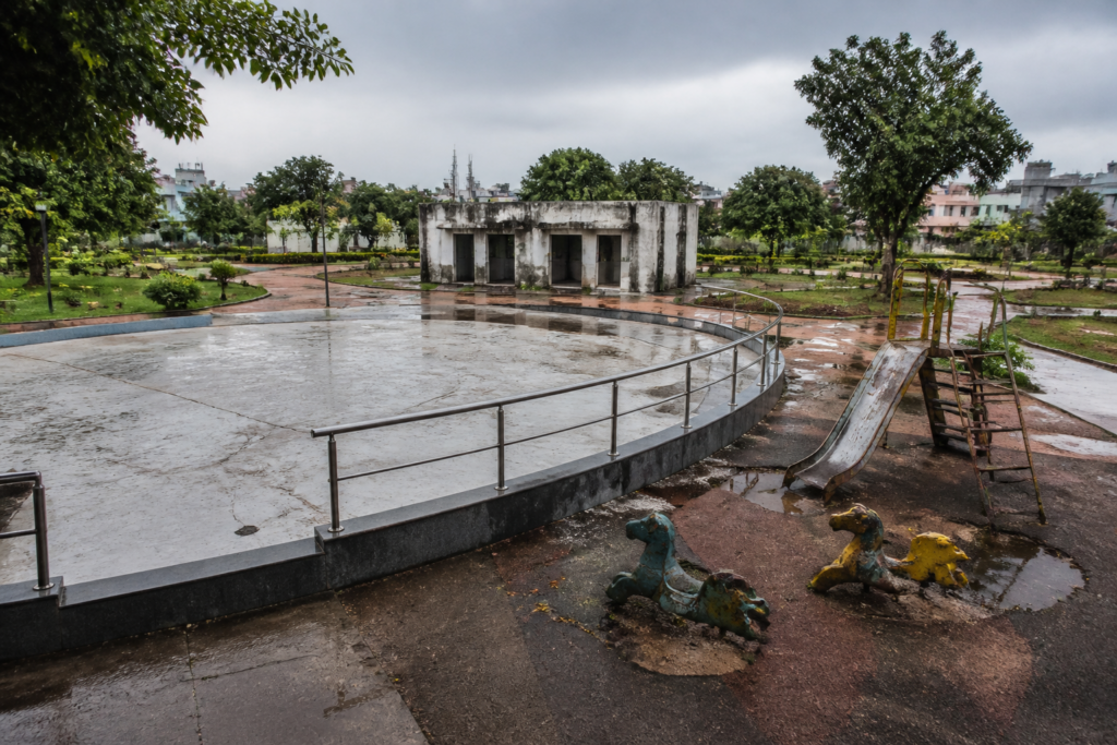 Murasoli Maran Park in Perambur showing damaged public park facilities and waterlogged walkways.