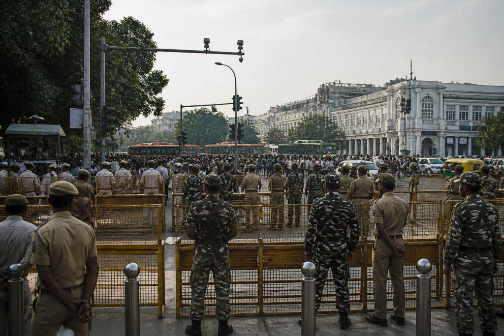 Delhi Tiranga march security barricades and police deployment near Connaught Place