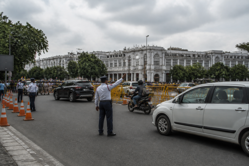 Delhi traffic advisory showing vehicles diverted near Connaught Place during a flag march