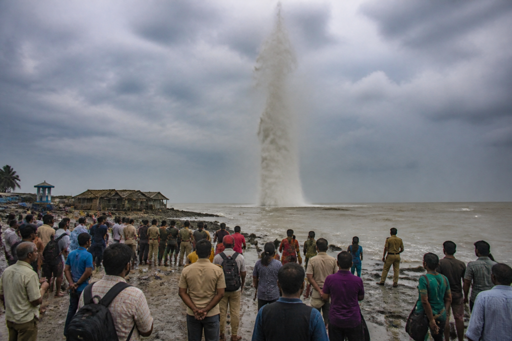 Gangasagar water spout rising from the sea near the coastal bathing ghat