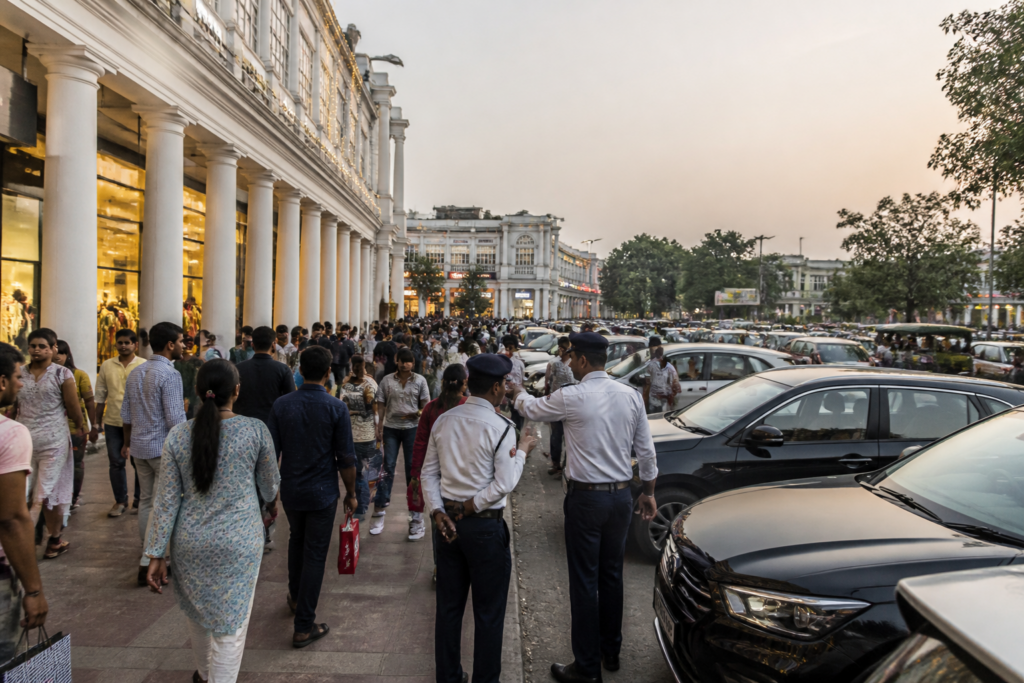 Delhi traders protest ban demand near a busy Connaught Place market during Diwali shopping