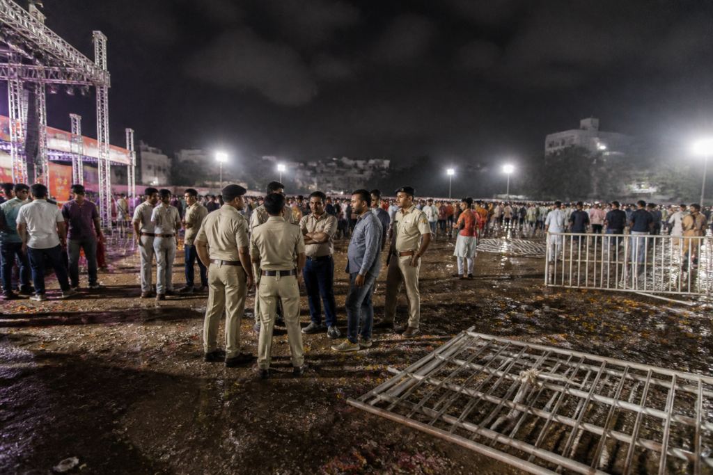 Police and organisers at a disrupted Durg garba event at a public ground