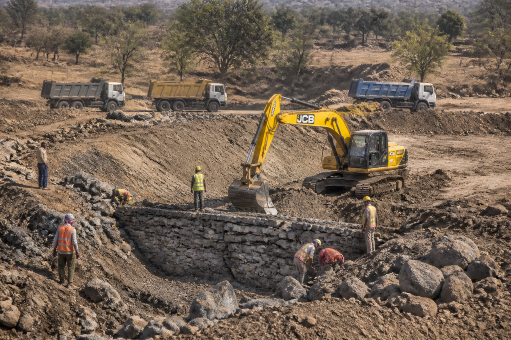 Naam Foundation water conservation work at a check dam in drought-affected Pune district