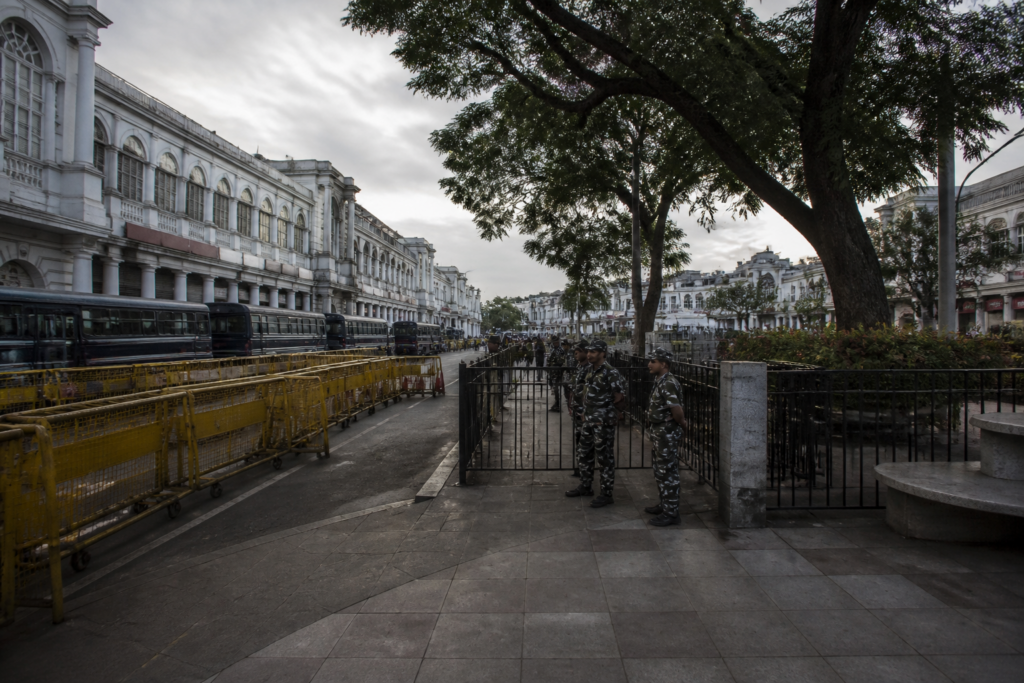 Connaught Place protest barricades and buses outside Central Park in Delhi