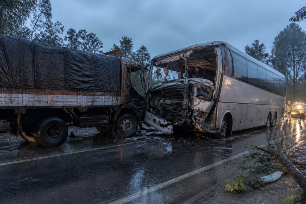 Damaged sleeper bus after the Mysuru bus accident near Periyapatna in Karnataka