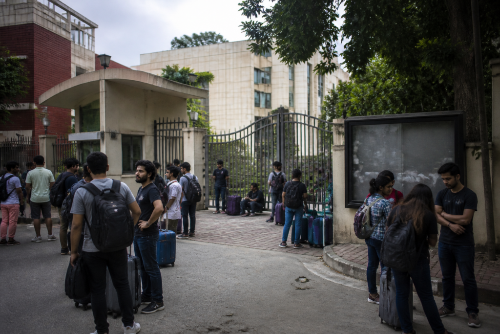 Students affected by the SRFTI campus closure, carrying luggage near hostels in Kolkata