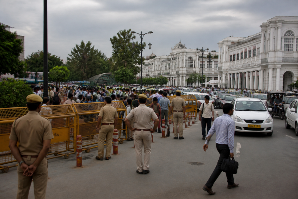 Delhi Police notice blocking a Tiranga march at Connaught Place amid heavy urban traffic