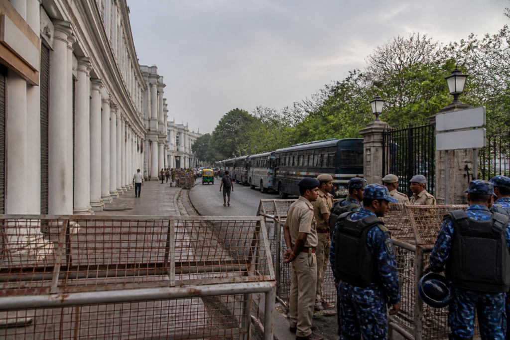 Connaught Place protest barricades and security personnel near Central Park in Delhi