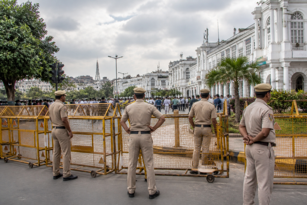 Delhi Police detention of a political organiser near Connaught Place ahead of a proposed rally