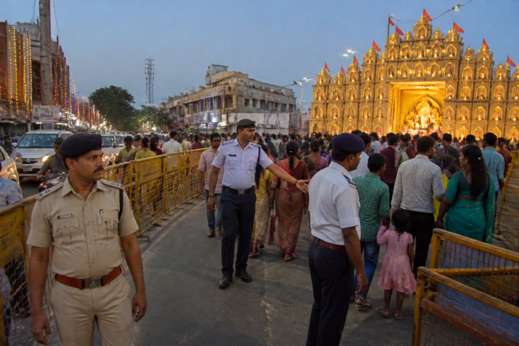 Ranchi Durga Puja security personnel managing traffic near festival pandals