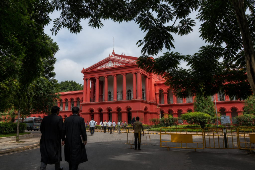 Karnataka High Court building linked to a directive on illegal immigration committees