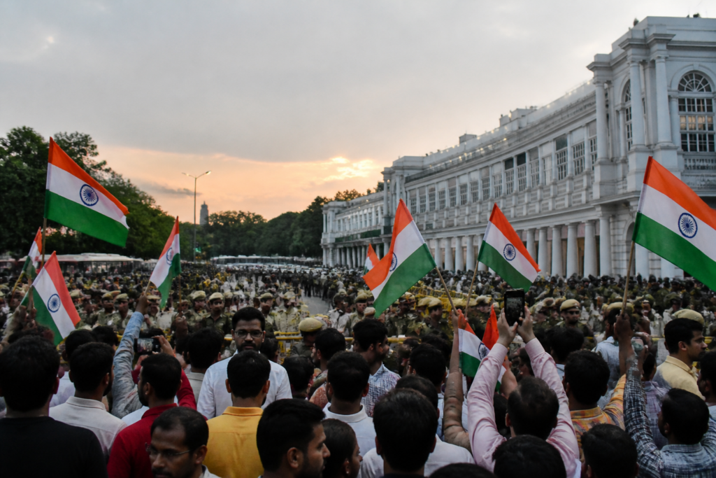 Police detain protesters during a Connaught Place protest in New Delhi.