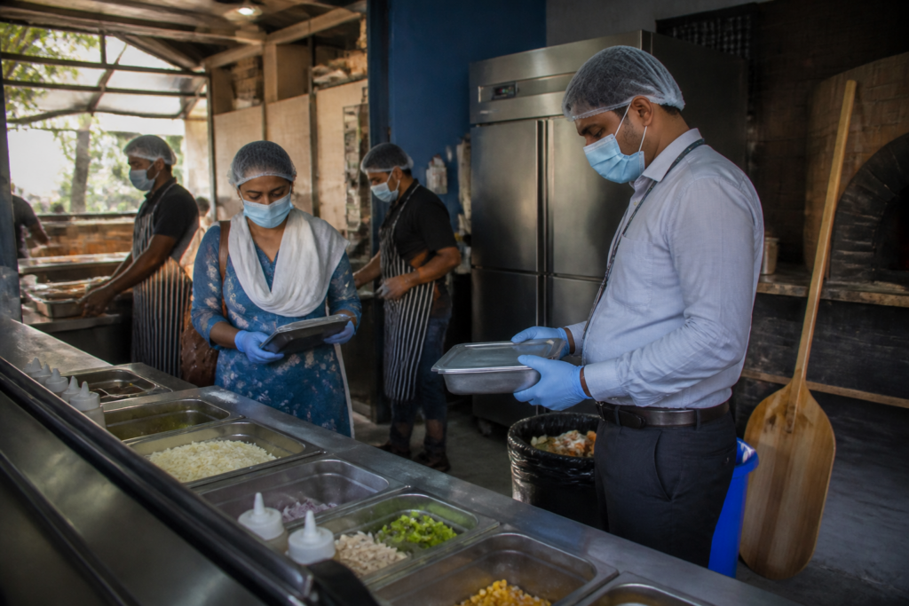Maharashtra FDA food safety inspection at a commercial kitchen with food storage and hygiene concerns