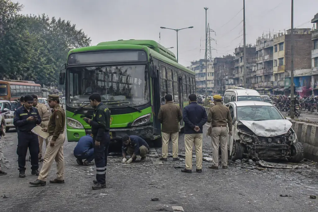DTC bus crash scene in Delhi’s Anand Parbat area with emergency responders near the roadway