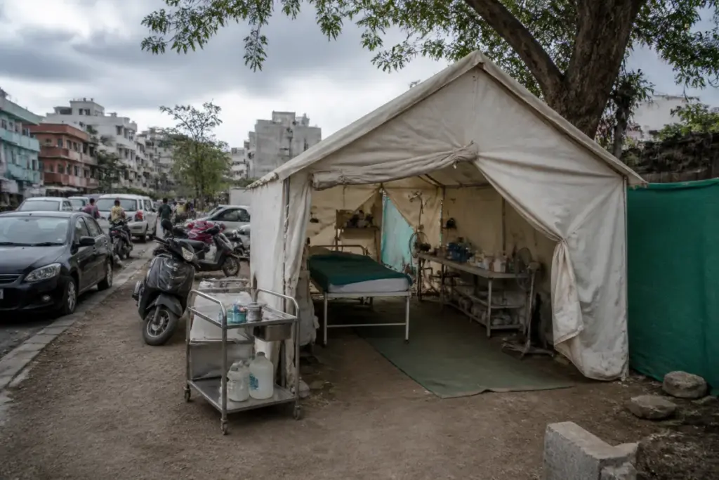 Illegal clinics in Pune represented by a roadside treatment tent near an urban neighbourhood