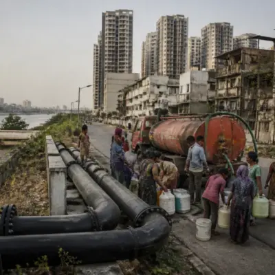 Ahmedabad water supply pipes and a tanker representing the city’s water crisis warning