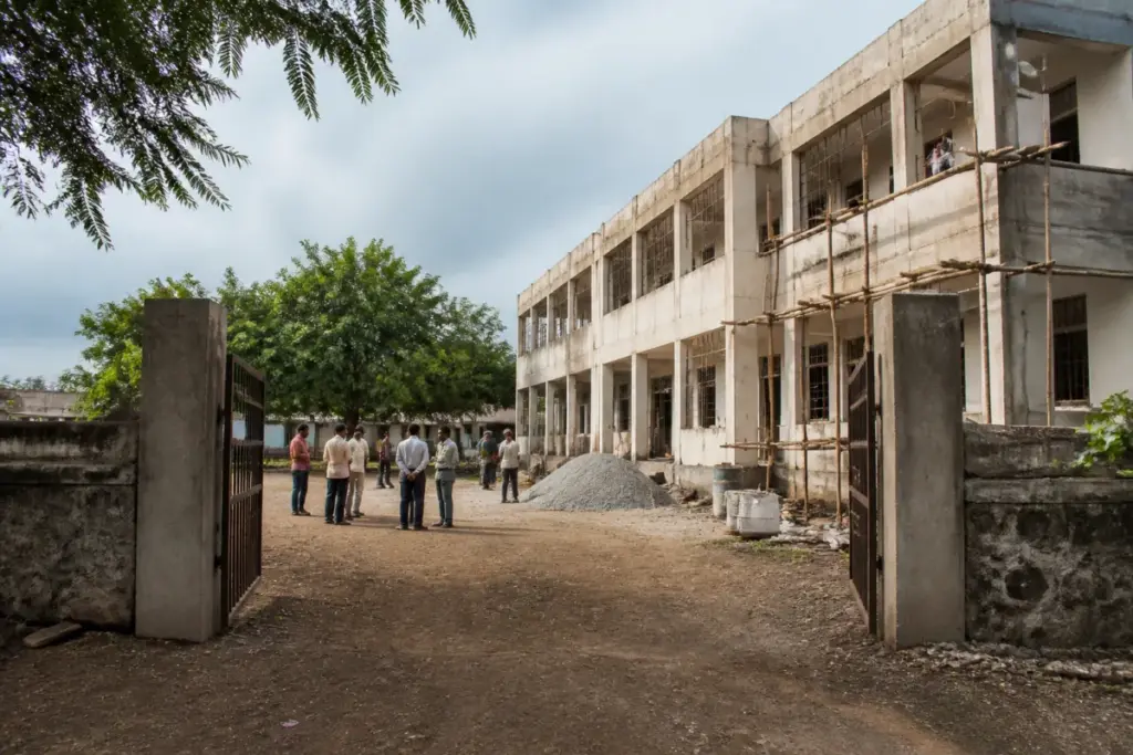 Pune ZP model school tender scrutiny involving a district school construction project