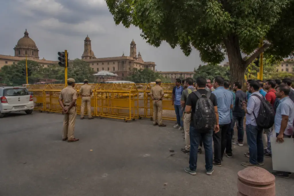Delhi protest police barricades near Jantar Mantar during a public-order operation
