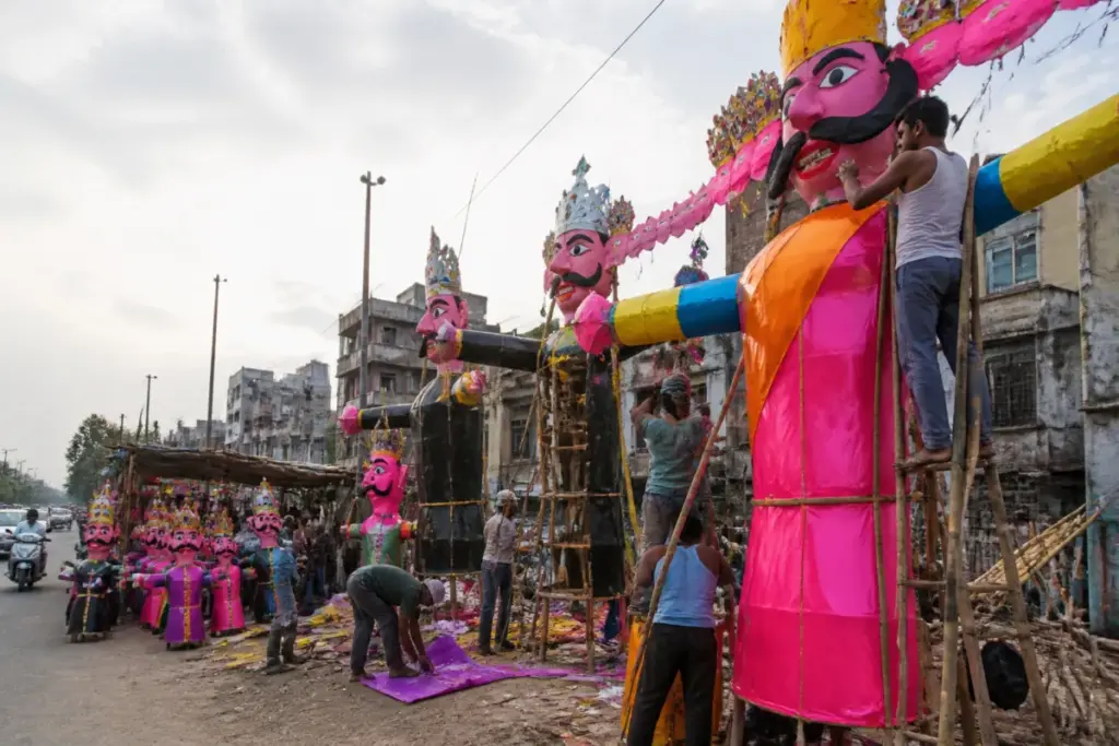 Titarpur Ravana effigies lined along a roadside market in Delhi