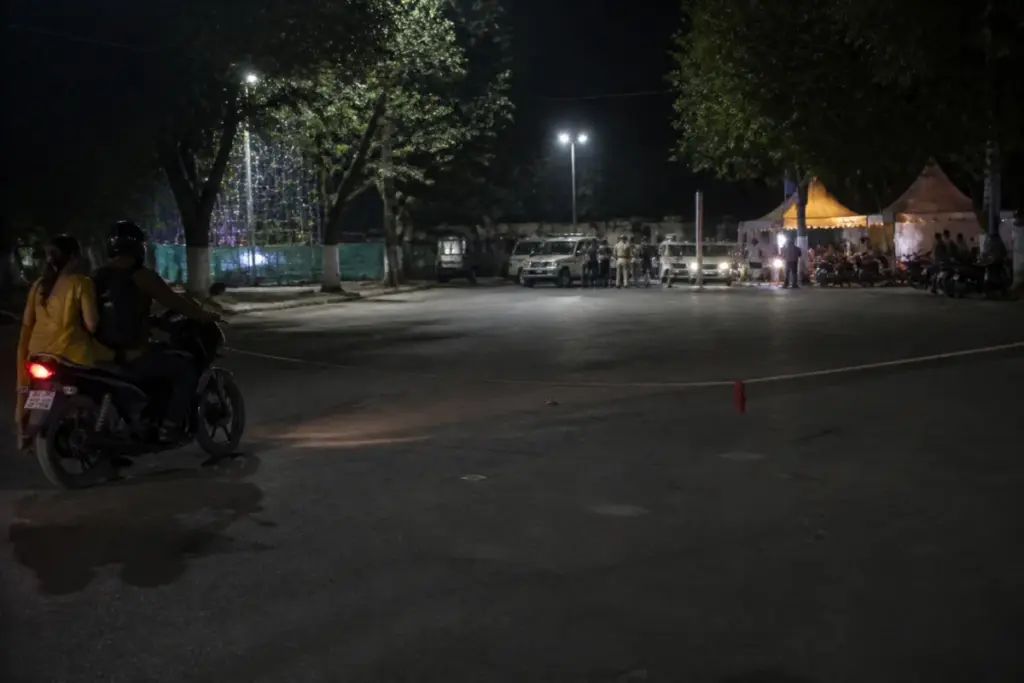 Ambikapur rope barricade accident scene near a temporary public event venue at night