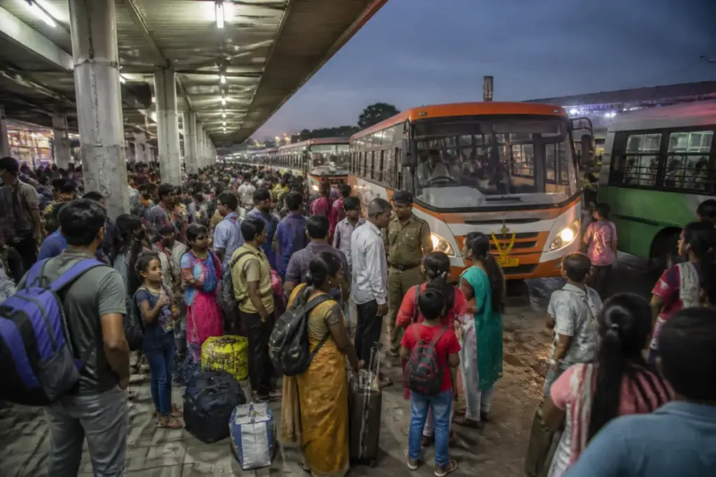 Hyderabad Dasara rush at a crowded bus terminal with passengers travelling home
