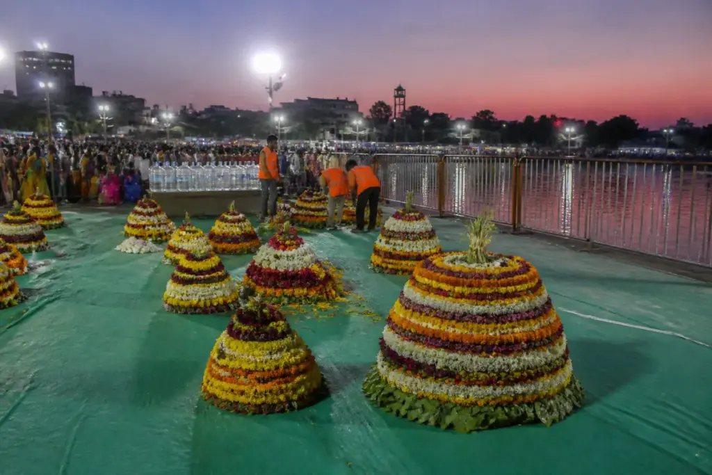 Karimnagar Bathukamma arrangements at a decorated venue with barricades and municipal lighting