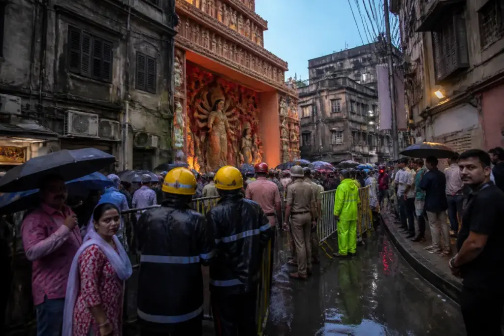 Crowd outside the Chorbagan Durga Puja pandal in Kolkata after a reported stampede