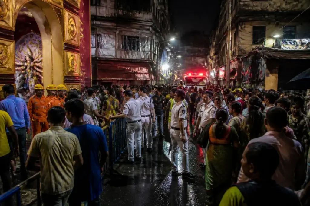 Crowded Kolkata Durga Puja pandal lanes after a deadly stampede