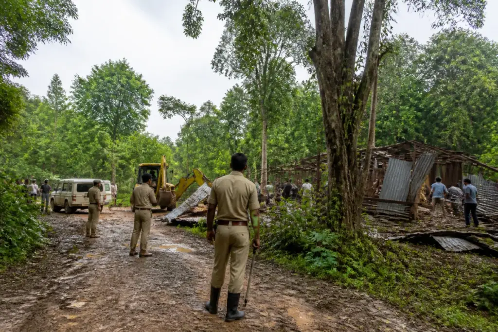 Assam forest land eviction operation clearing structures from a protected reserve forest