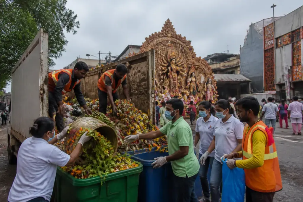 Jamshedpur flower waste collection vehicle serving a Durga Puja pandal