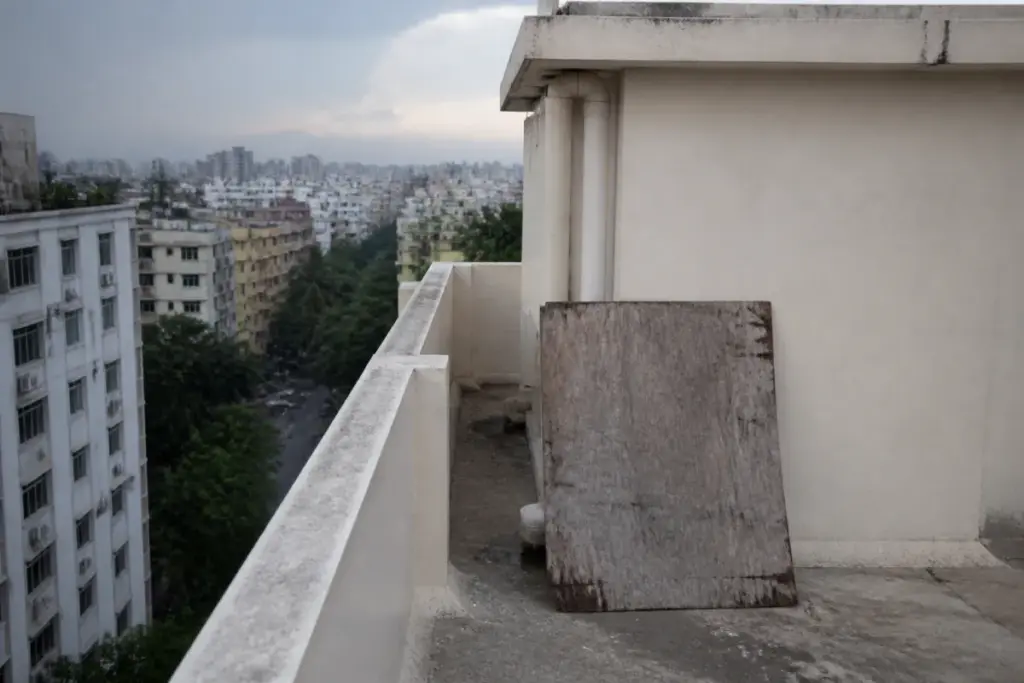 Kolkata residential building terrace linked to a fatal terrace fall investigation