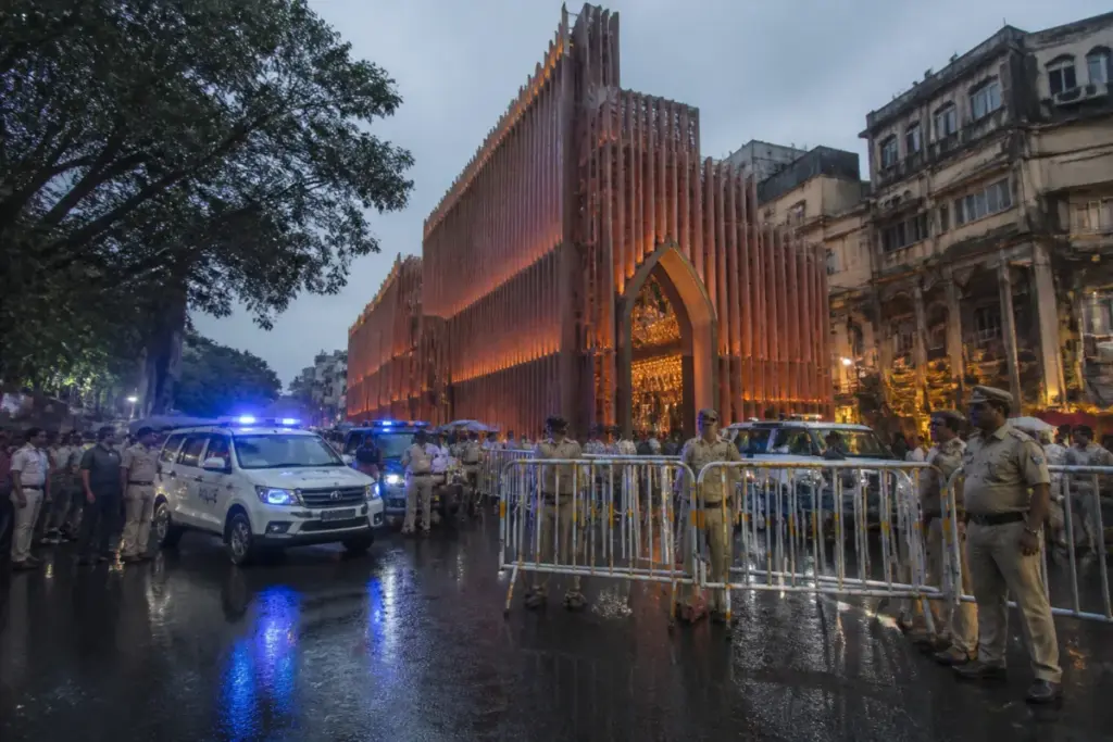 Kolkata stampede site at a Durga Puja pandal with police and crowd-control barriers