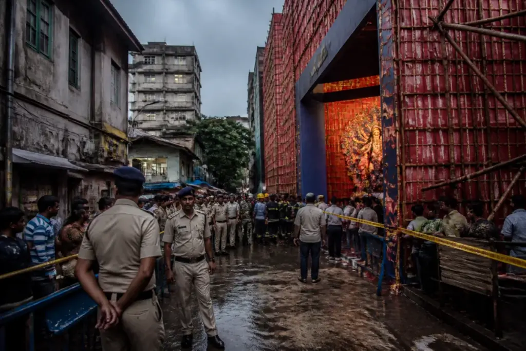 Kolkata Durga Puja stampede site near a crowded pandal and narrow lane