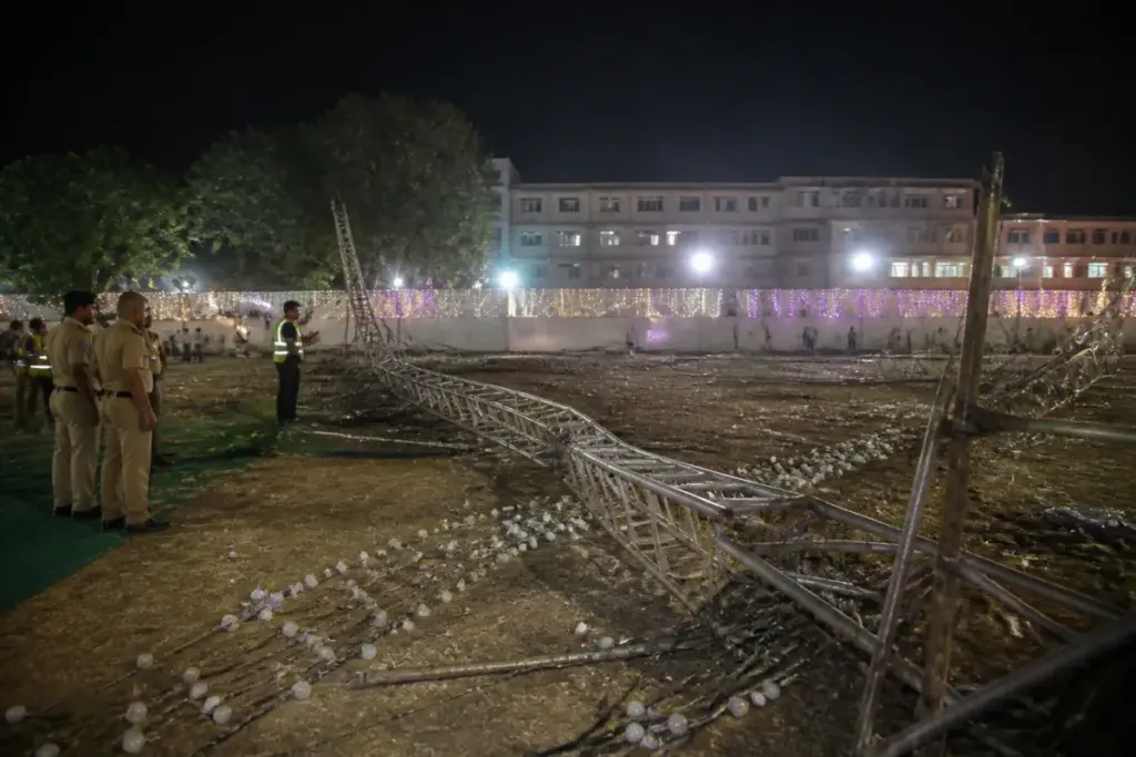 Hyderabad dandiya accident scene showing a collapsed temporary lighting frame at a college event