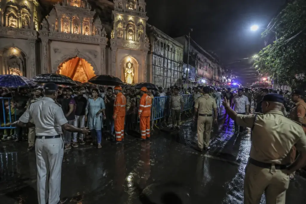 Kolkata pandal stampede aftermath near a crowded Durga Puja venue