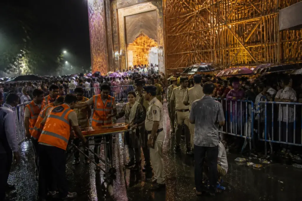 Kolkata stampede aftermath near a crowded Durga Puja pandal