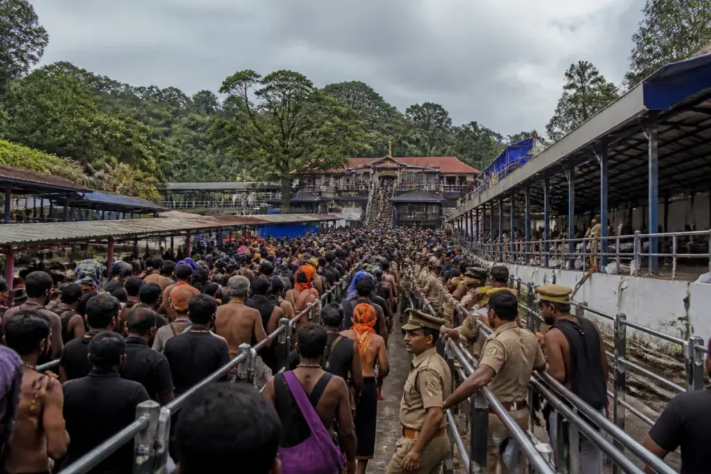 Sabarimala pilgrimage preparations with devotees near the hill shrine and temple access facilities