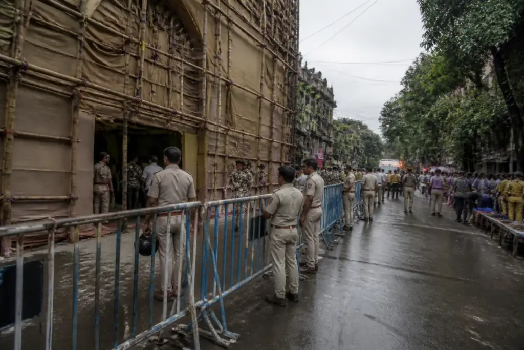 Kolkata police arrests after a deadly Chorebagan Durga Puja pandal disaster