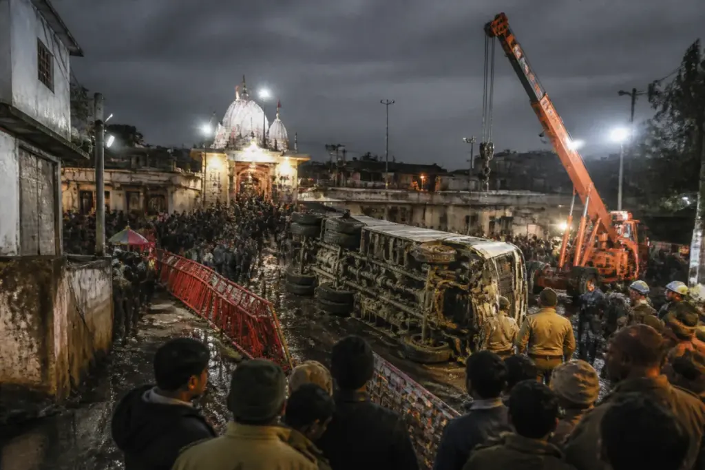 Gwalior truck crash site near Sheetla Mata Temple with rescue teams and damaged barricades