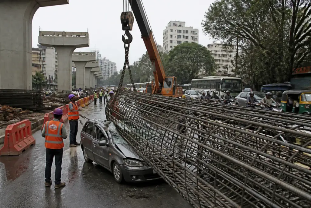 Thane elevated road construction site near Kopri Bridge after a reinforcement cage fell onto a car
