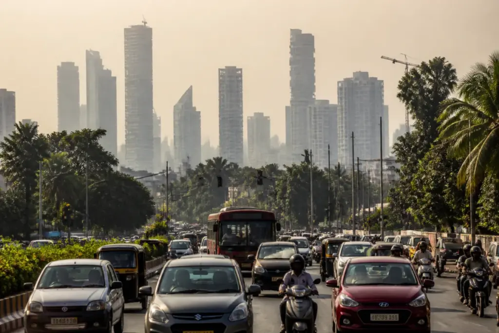 Mumbai weather with humid skies, traffic and hazy urban conditions on a hot day