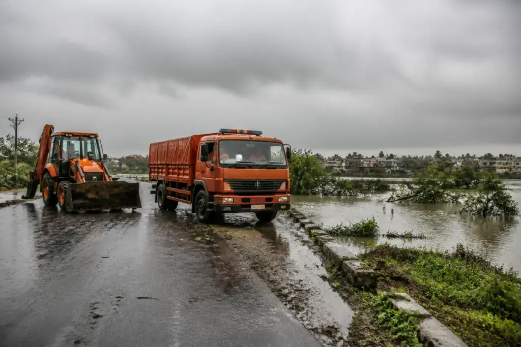Chengalpattu orange alert preparations near a rain-affected road and water body