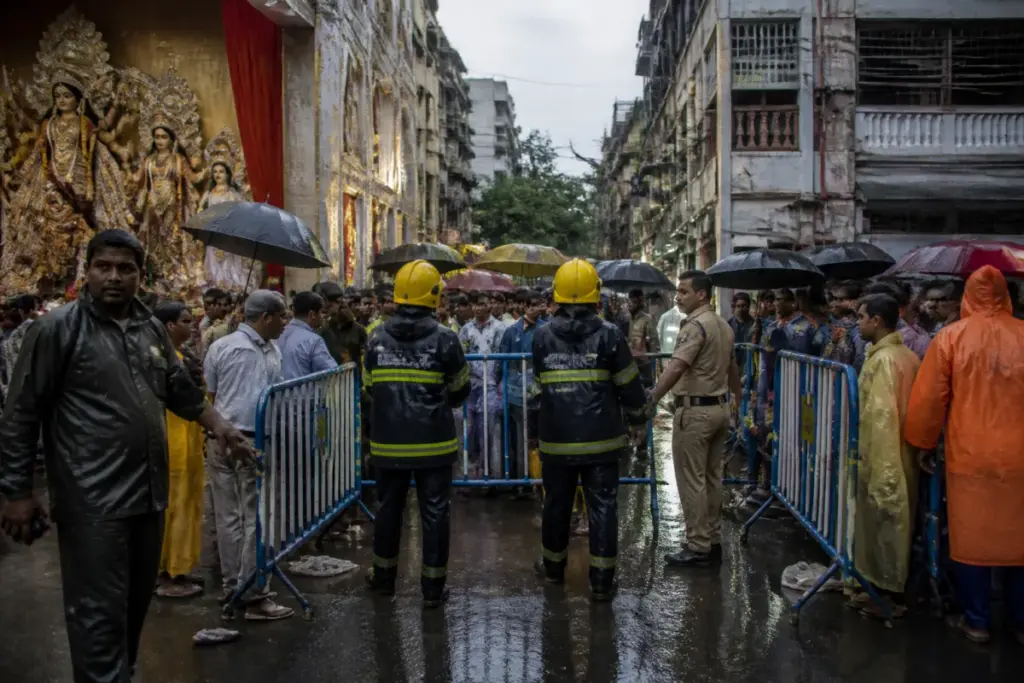 Kolkata stampede aftermath near a crowded Durga Puja pandal