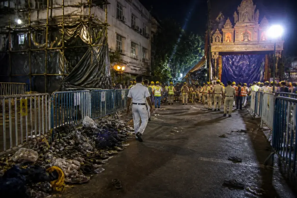 Chorbagan stampede aftermath near a crowded Kolkata puja pandal