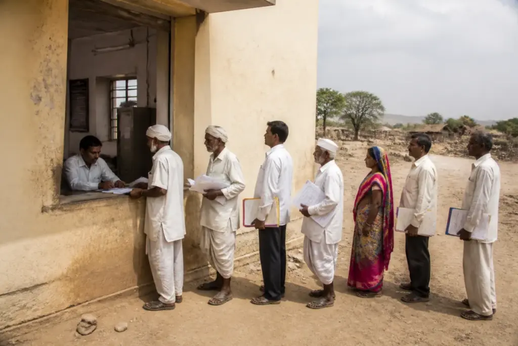 Farmers submitting drought relief documents at a government office in Kanagav