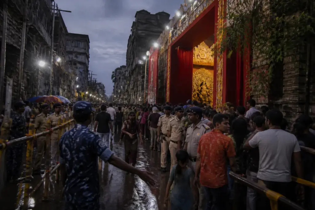 Chorbagan Durga Puja pandal and crowded Kolkata lane after the stampede